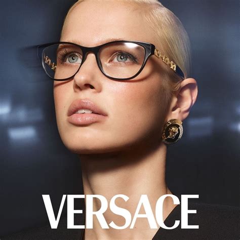 clear versace glasses on face.